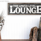 LOWER LEVEL LOUNGE SIGN