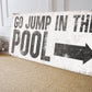 GO JUMP IN THE POOL SIGN