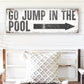 GO JUMP IN THE POOL SIGN