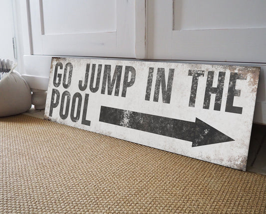 GO JUMP IN THE POOL SIGN